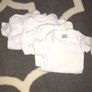 4 short sleeve NB Gerber white onesies